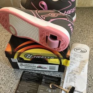 Heelys size 6 youth, size 7 women. Grey/pink.